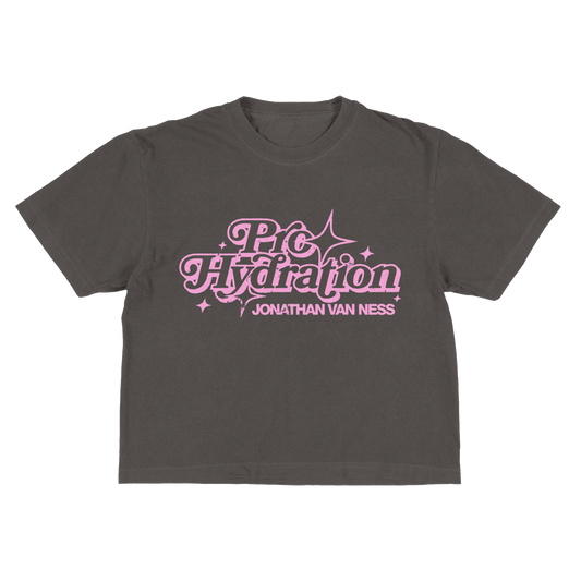 Jonathan Van Ness gray Pro Hydration Cropped Tee featuring a pink graphic on the front that reads 'Pro Hydration' and 'JONATHAN VAN NESS'.